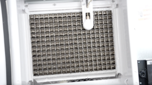 ice machine grid-style evaporator plate with water flowing over it